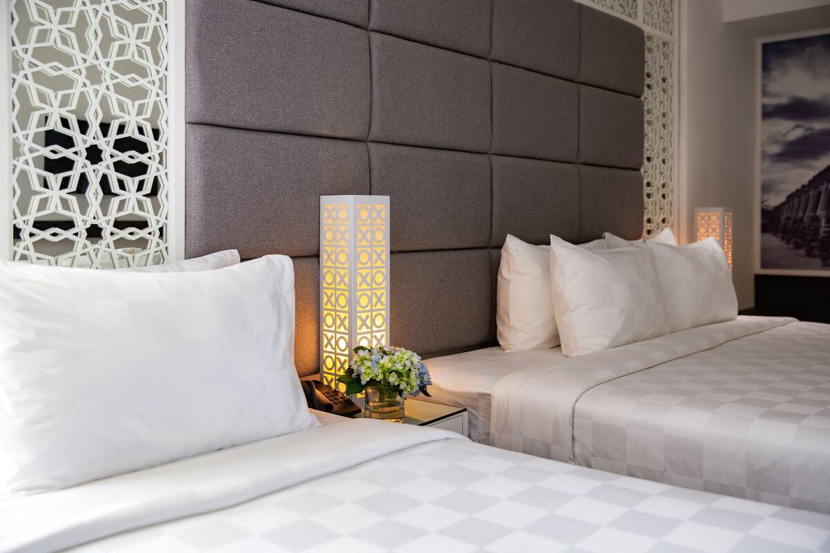 Roba de llit d'alta qualitat, minibar i caixa forta a l'habitació 