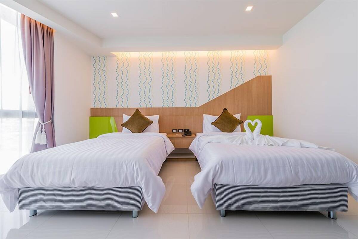 superior twin room | in-room safe, laptop workspace, blackout curtains, rollaway beds