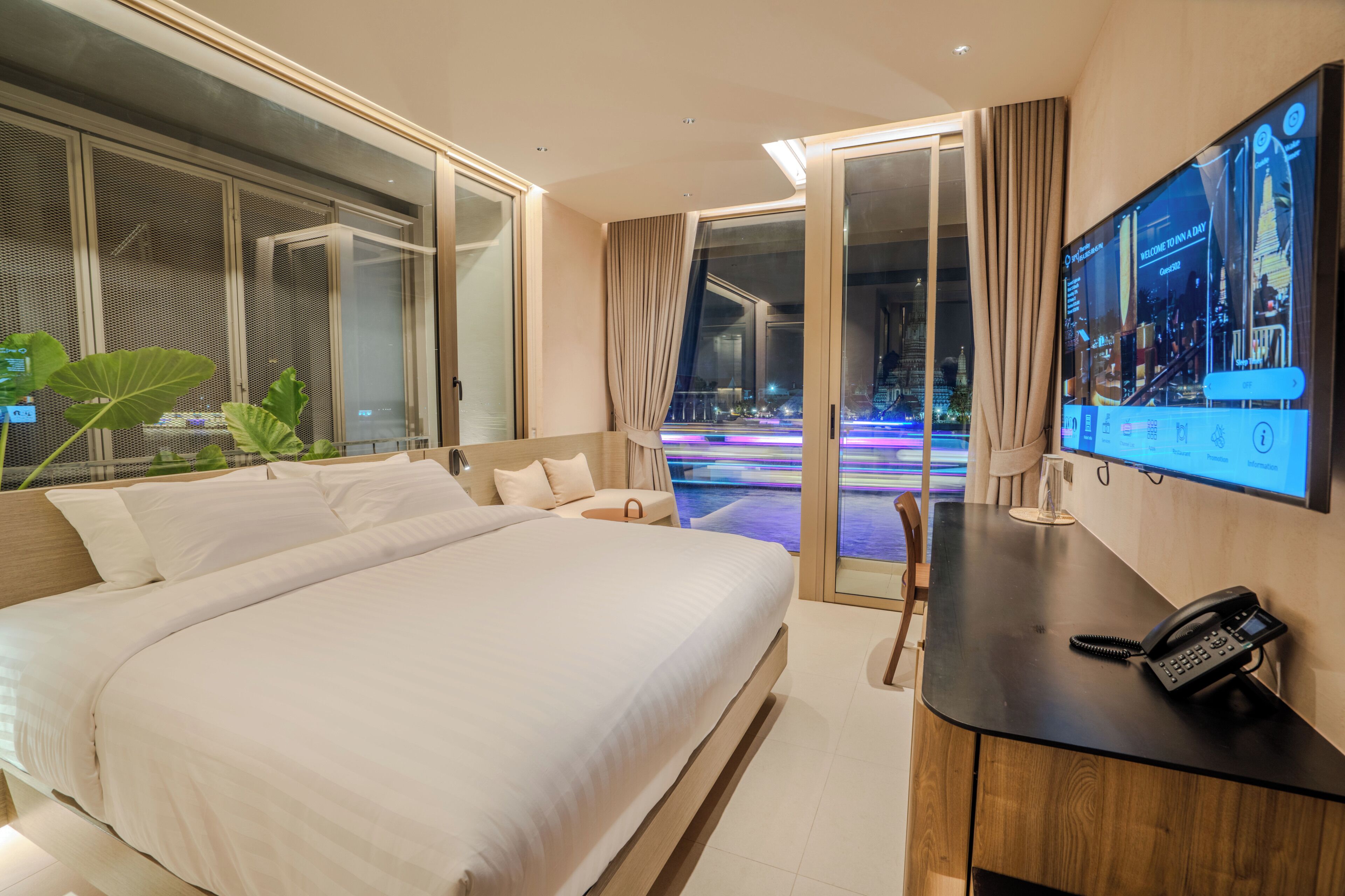 Deluxe Double Room with River View (Higher Floor) | Premium bedding, in-room safe, desk, laptop workspace