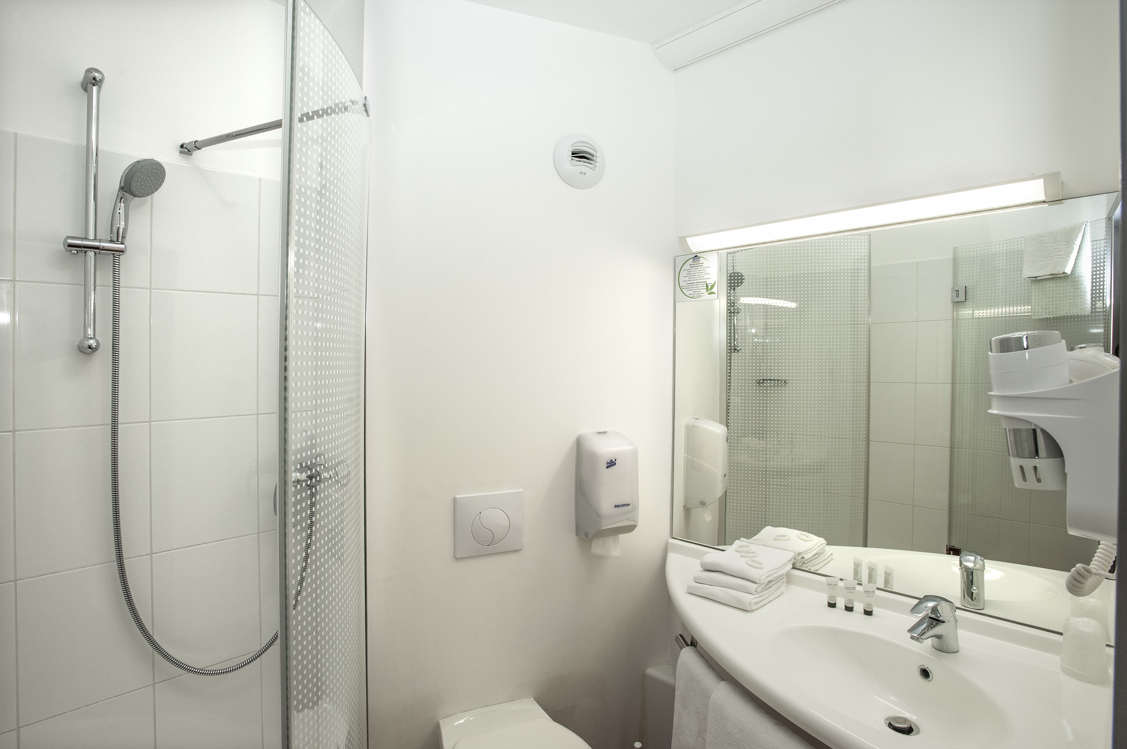 shower, free toiletries, hair dryer, towels