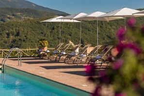 2 outdoor pools, pool umbrellas, pool loungers