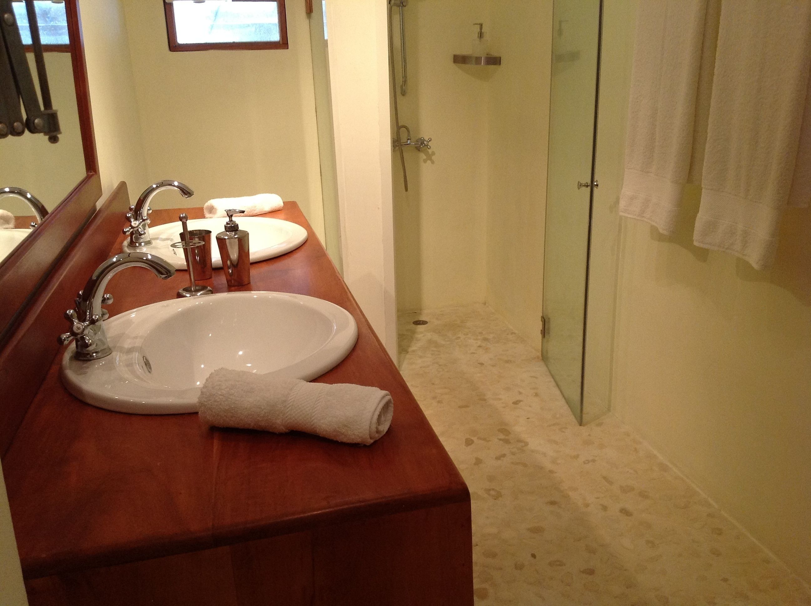 standard double room | bathroom | shower, hair dryer, towels, soap