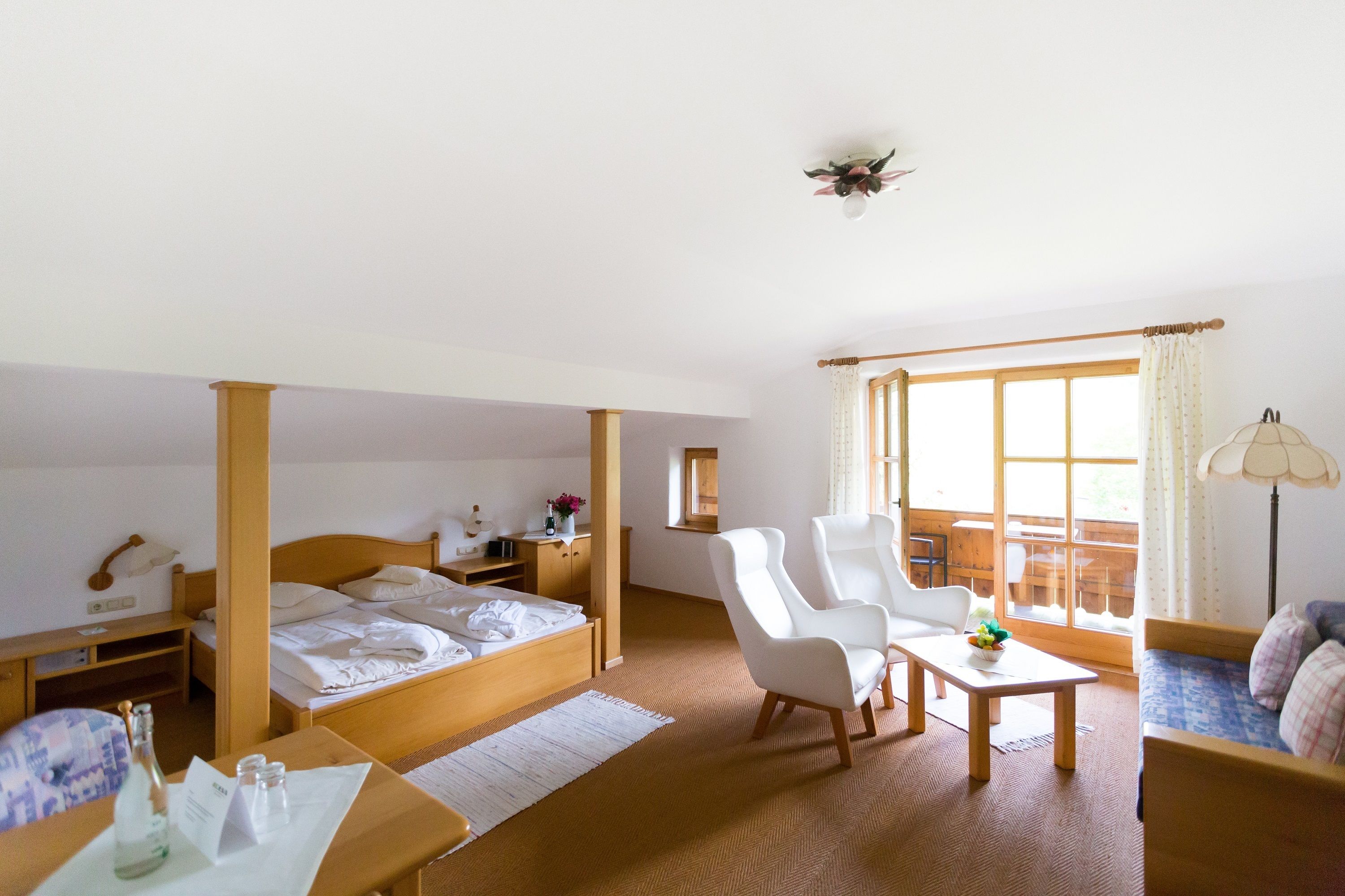 family room | 1 bedroom, in-room safe, desk, blackout curtains