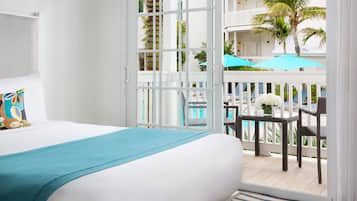 Pool and Garden View King with Balcony | Premium bedding, minibar, in-room safe, desk