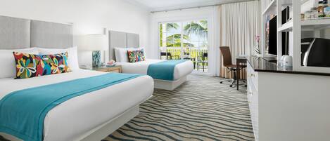A hotel room with two beds, a desk, a chair, and a minibar.