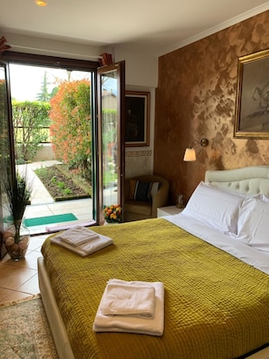 Deluxe Double Room | Blackout curtains, cots/infant beds, free WiFi, bed sheets