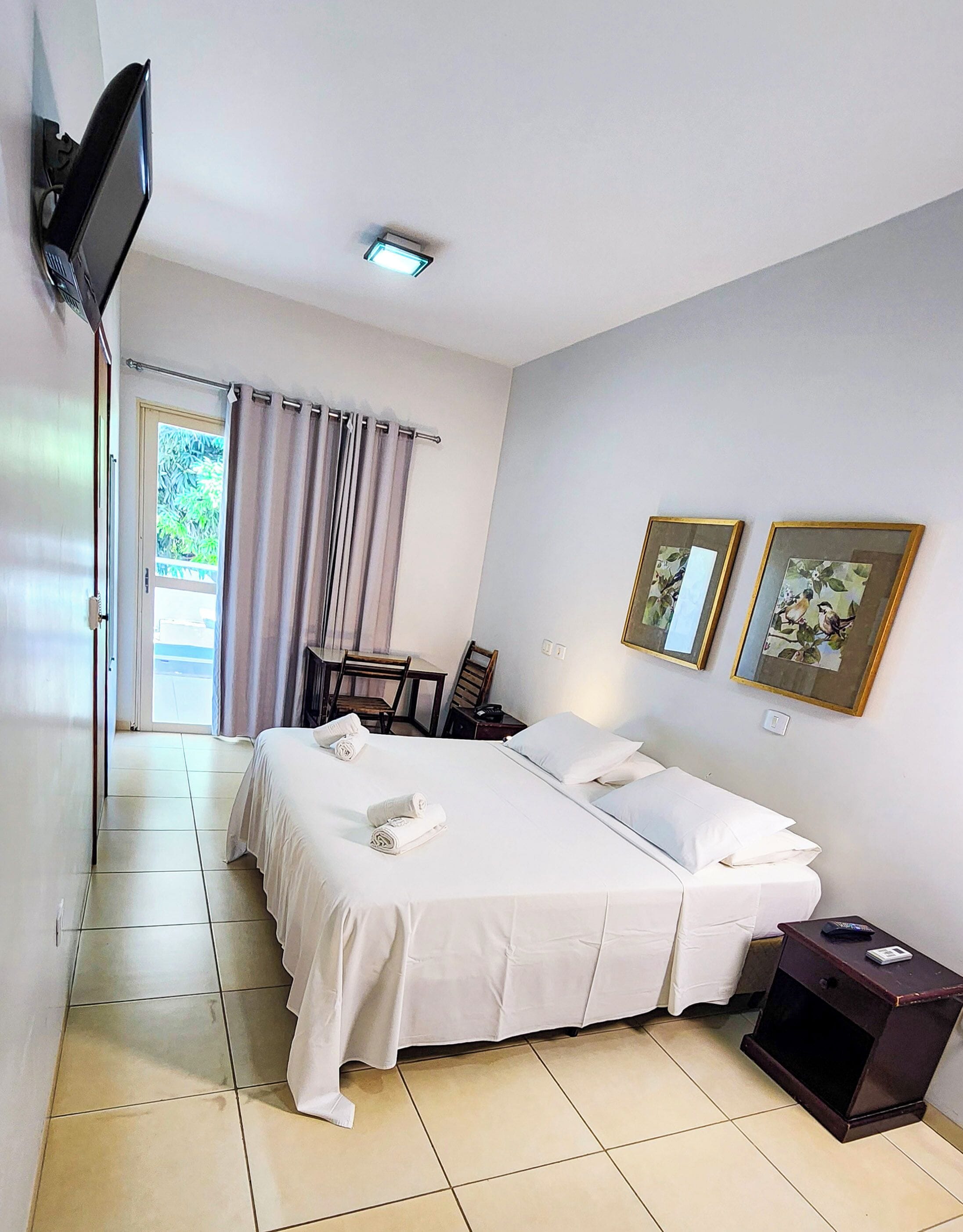 Habitación estándar con 1 cama doble o 2 individuales, 1 cama doble o 2 individuales | Minibar, caja fuerte, cunas gratuitas y cuna de viaje