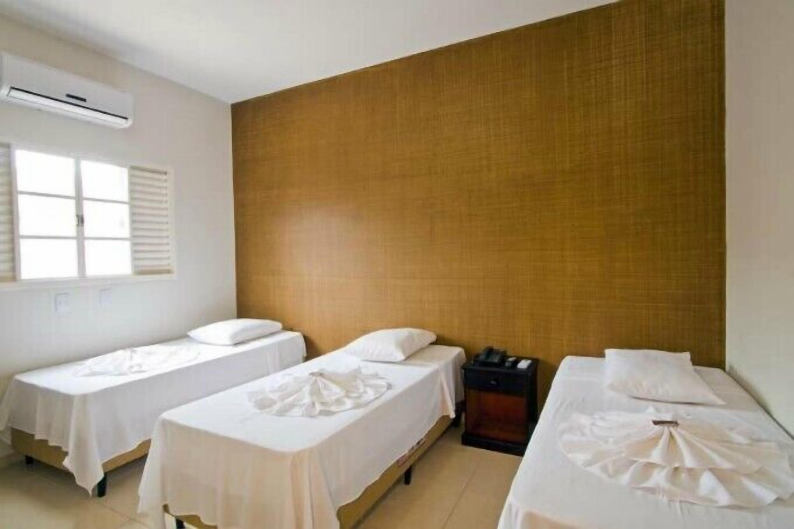 triple room | minibar, in-room safe, free cots/infant beds, travel cot