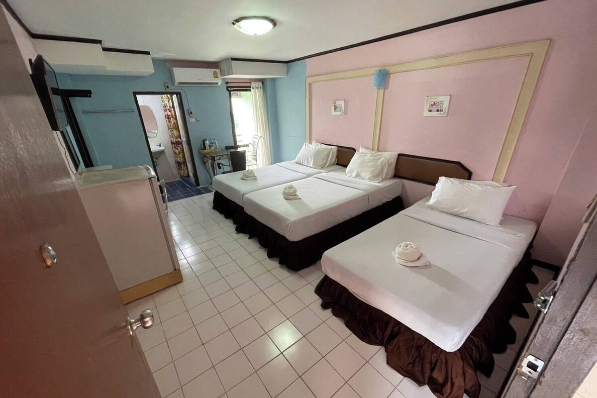 Triple Room, Non Smoking, City View | In-room safe, free WiFi, bed sheets