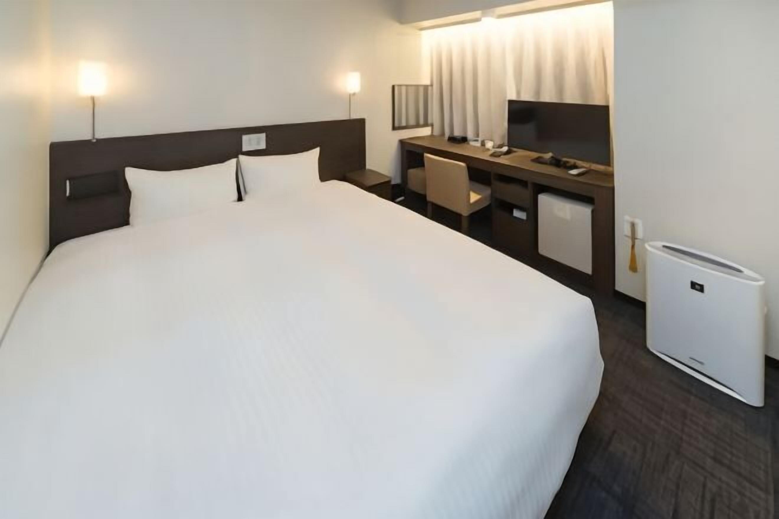 Premium bedding, blackout curtains, free WiFi, bed sheets