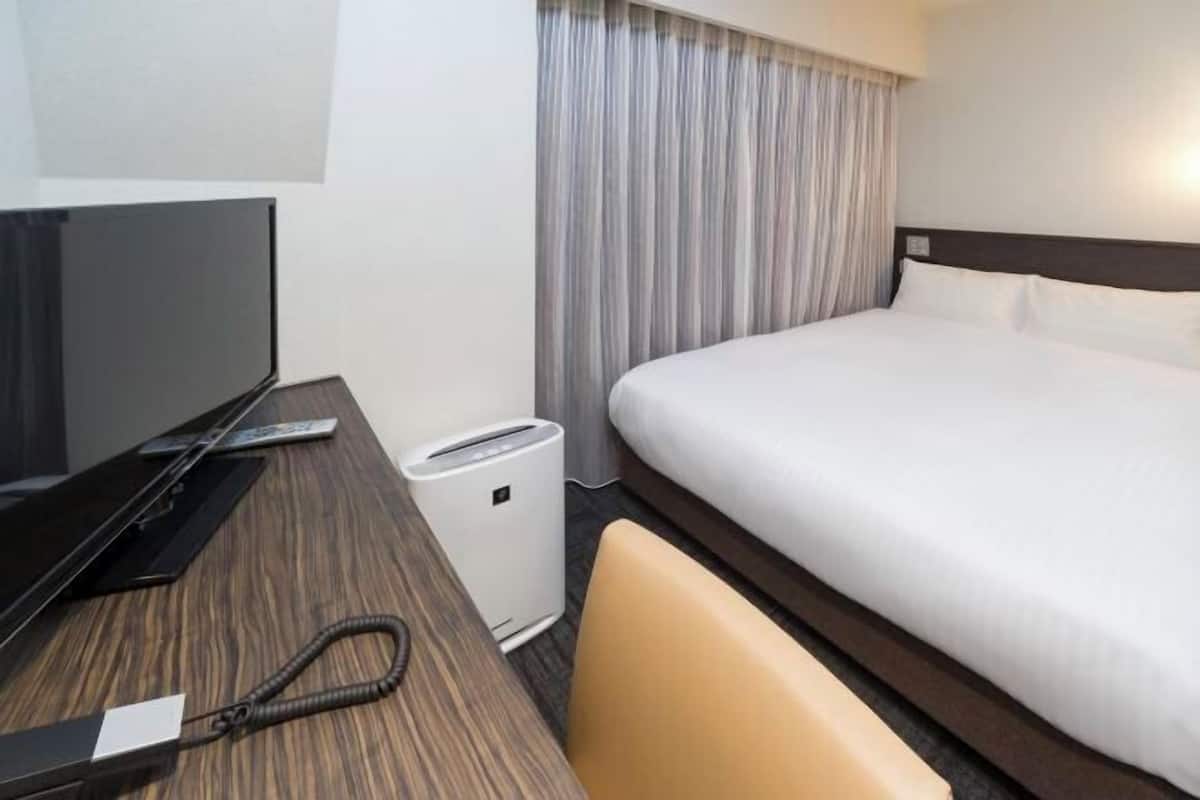 Luxe beddengoed, verduisterende gordijnen, gratis wifi, beddengoed