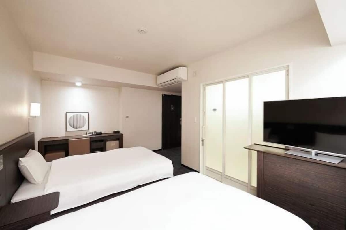 Luxe beddengoed, verduisterende gordijnen, gratis wifi, beddengoed