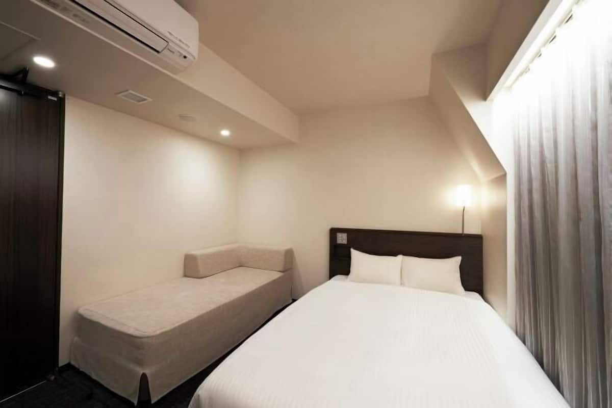 Luxe beddengoed, verduisterende gordijnen, gratis wifi, beddengoed