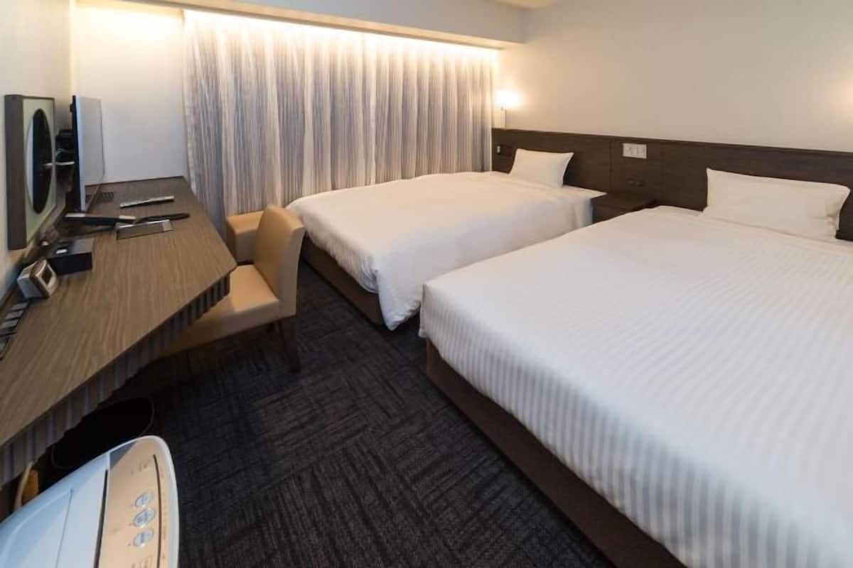Luxe beddengoed, verduisterende gordijnen, gratis wifi, beddengoed