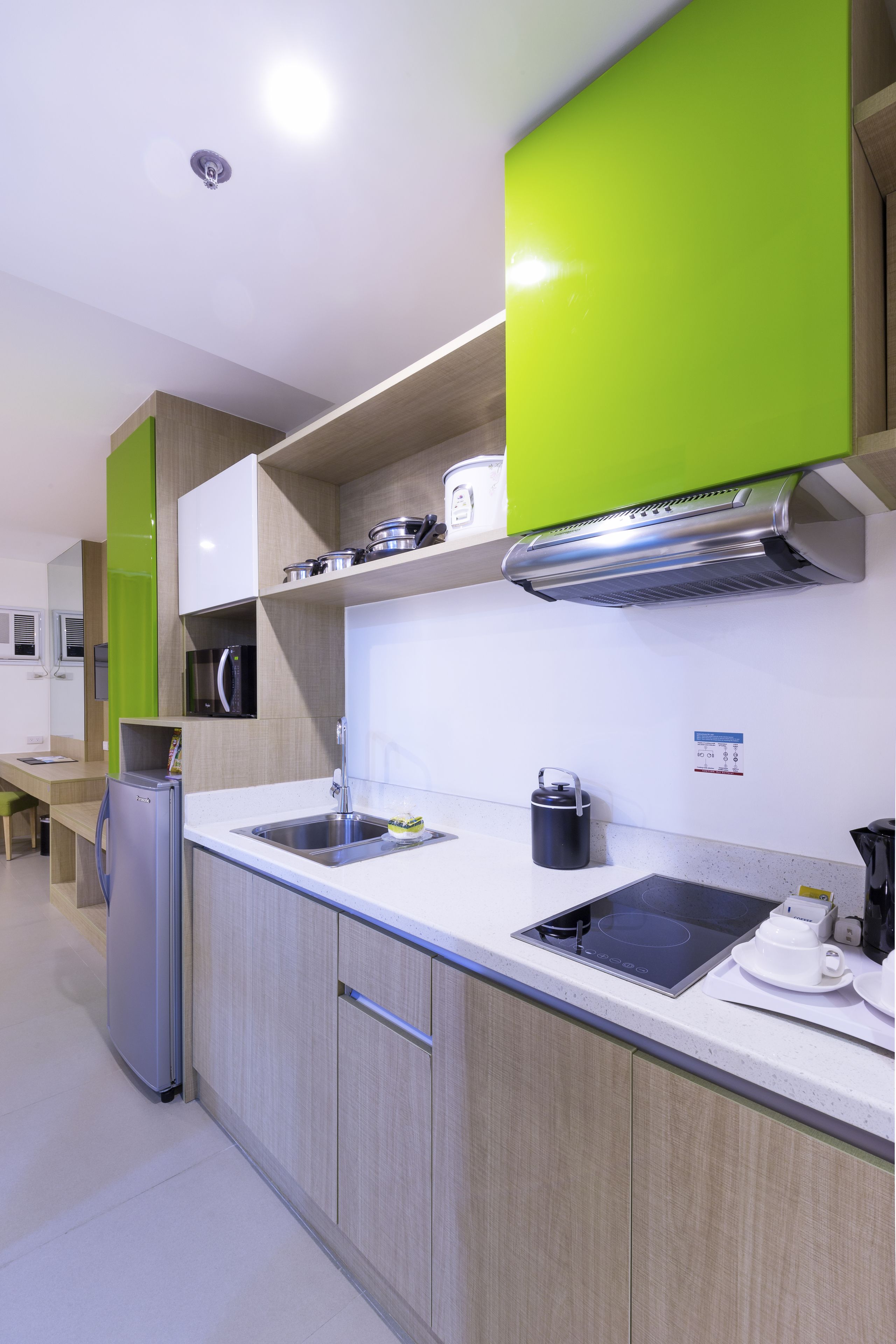 deluxe room | private kitchen | microwave, coffee/tea maker, electric kettle, cookware/dishes/utensils