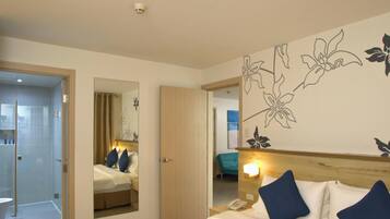 Apartment, 2 Bedrooms | Minibar, in-room safe, laptop workspace, blackout drapes