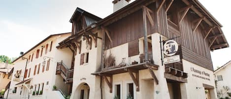 A traditional building with a sign for "Hotel Restaurant."