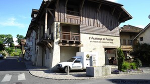 A traditional wooden building with a sign reading "L'Aurège d'Antry." - Auberge d'Anthy (Anthy-sur-Leman)