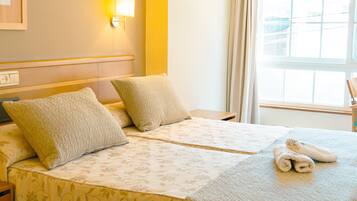 Double Room, City View | Desk, blackout drapes, cribs/infant beds, free WiFi