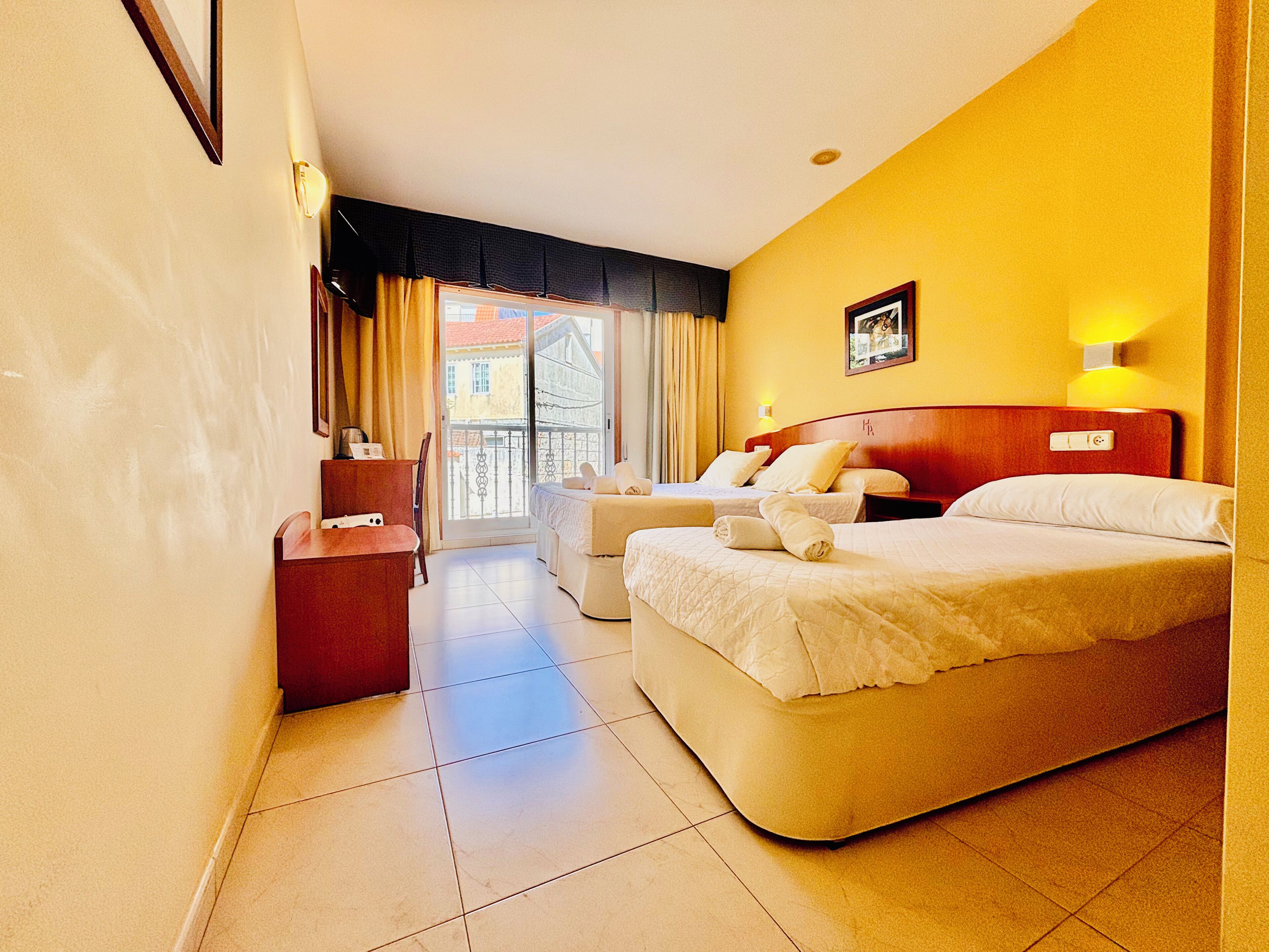 Triple Room, Garden View | In-room safe, desk, cots/infant beds, free WiFi