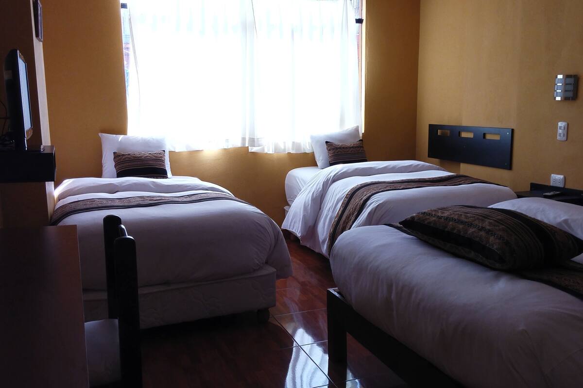Triple Room | Blackout drapes, rollaway beds (surcharge), WiFi (free)