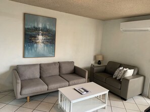 2 Bedroom Apartment | Living area | Flat-screen TV, DVD player - Northpoint Holiday Apartments (Alexandra Headland)