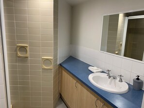 2 Bedroom Apartment | Bathroom | Shower, hair dryer, towels - Northpoint Holiday Apartments (Alexandra Headland)