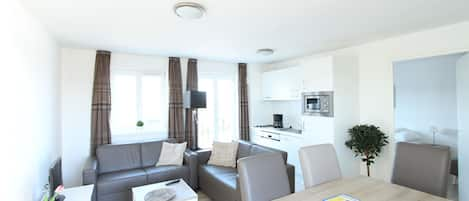 Apartment, 2 Bedrooms | Living room | Flat-screen TV