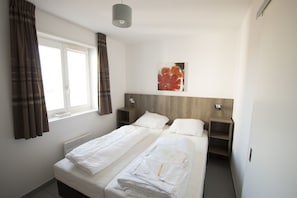 Appartement Confort | Literie de qualité supérieure, lits bébé (en supplément), draps fournis