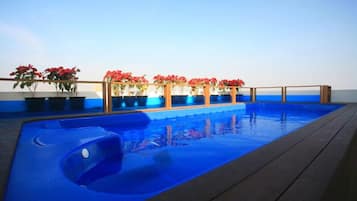 Outdoor pool, pool umbrellas, pool loungers