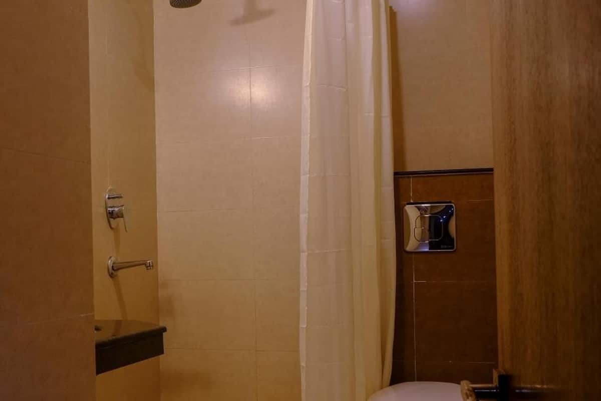 shower, free toiletries, slippers, towels