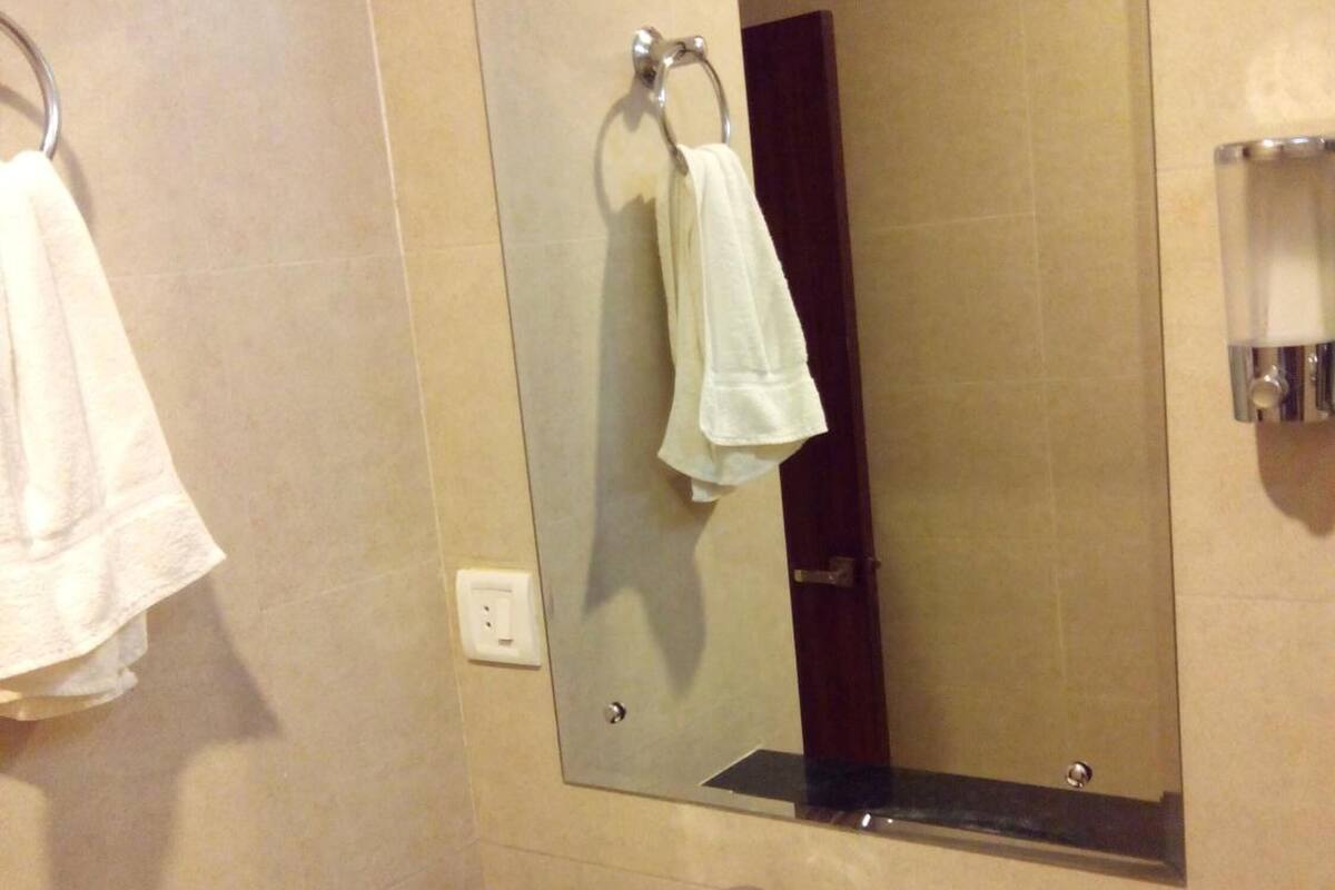 shower, free toiletries, slippers, towels