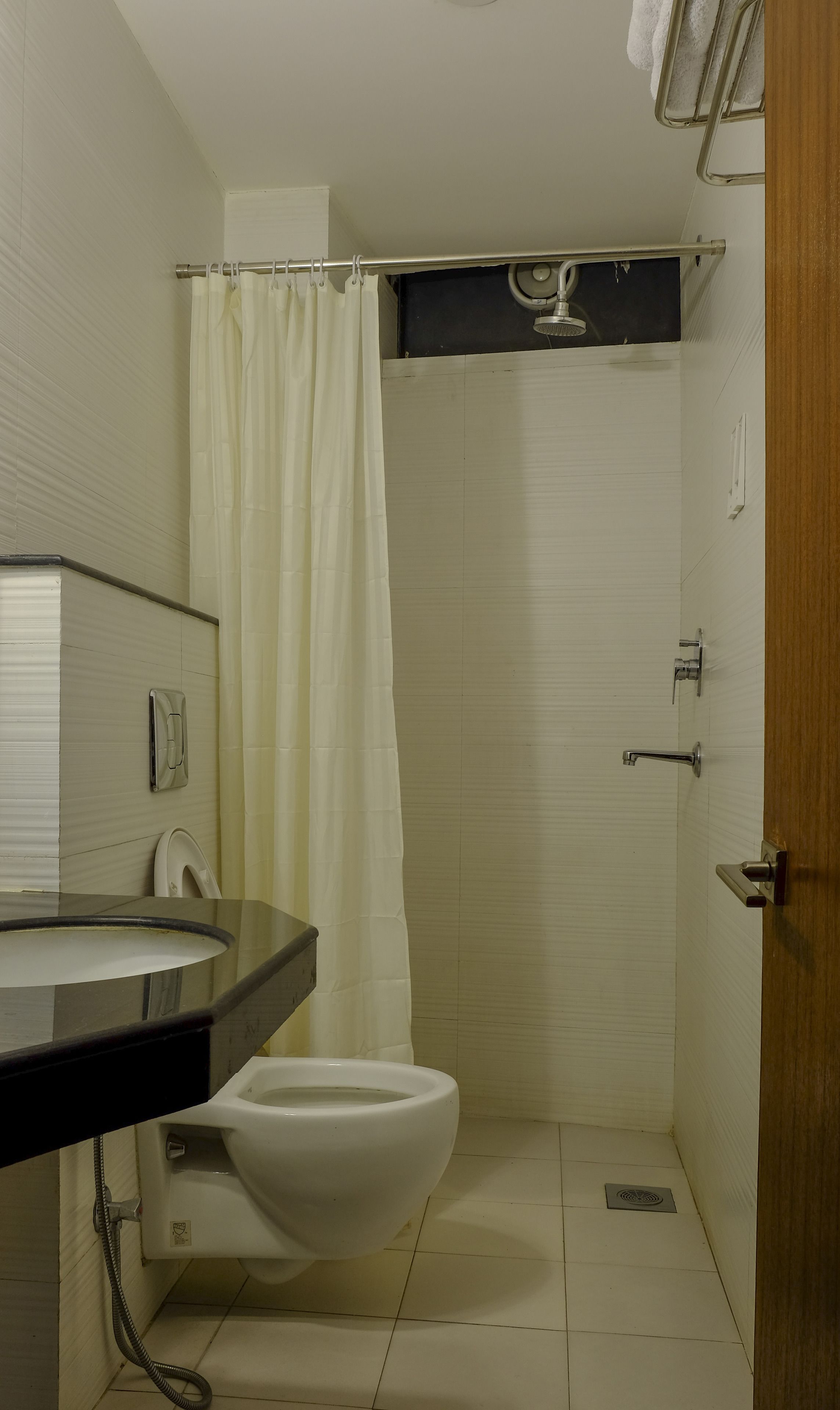 shower, free toiletries, slippers, towels