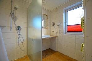 Shower, free toiletries, hair dryer, towels