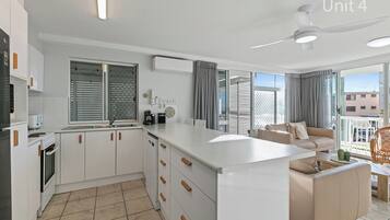 3 Bedroom Apartment | Private kitchen | Full-sized fridge, microwave, dishwasher, electric kettle