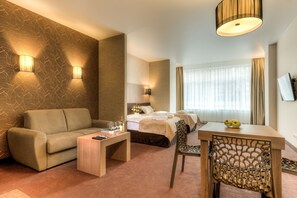 Ropa de cama de alta calidad y minibar 