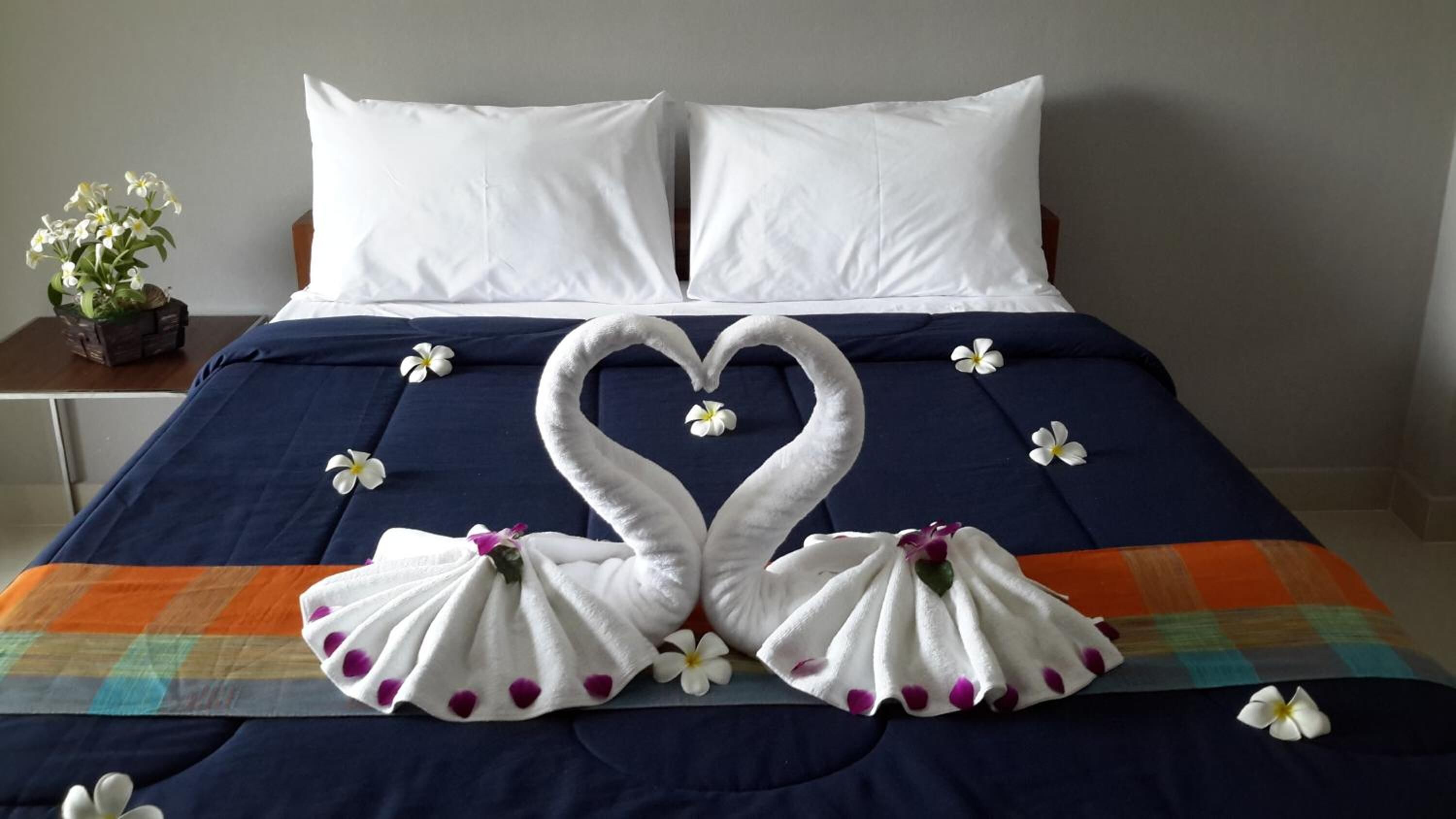 hypo-allergenic bedding, in-room safe, desk, rollaway beds