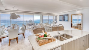 3 Bedroom Executive Luxe Apartment | Private kitchen | Full-size fridge, microwave, oven, stovetop