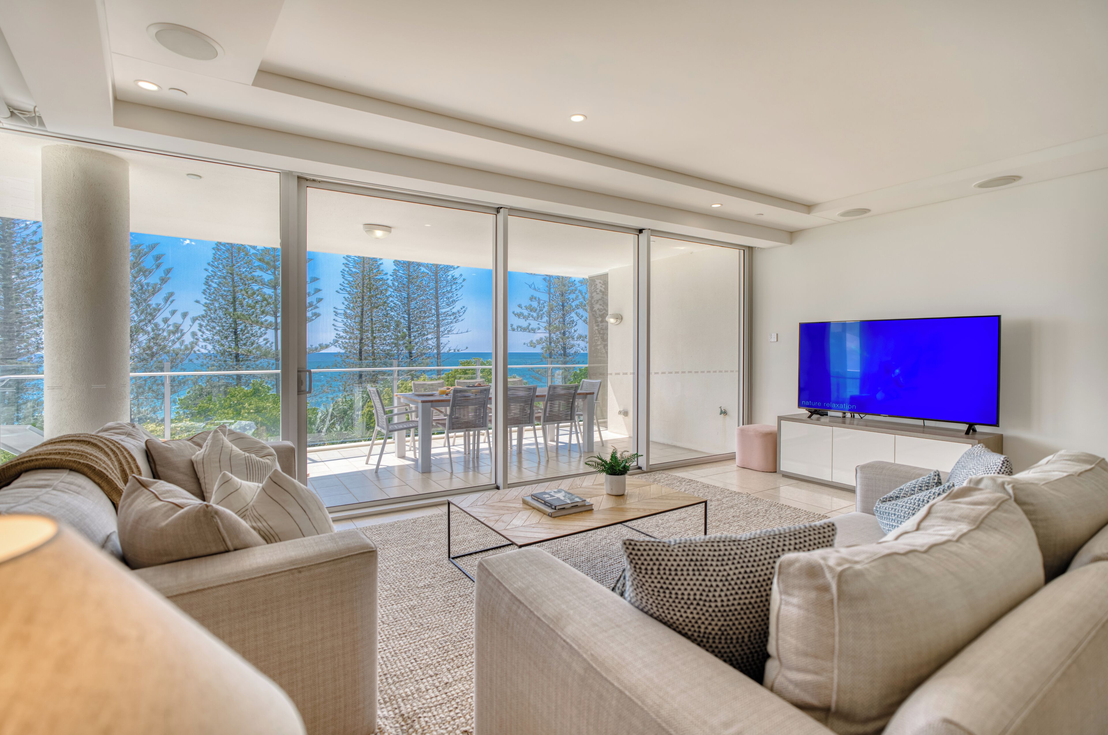 3 Bedroom Deluxe Apartment | Living area | Flat-screen TV, DVD player