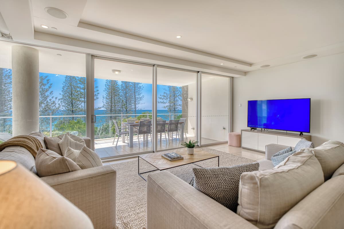 3 Bedroom Deluxe Apartment | Living area | Flat-screen TV, DVD player