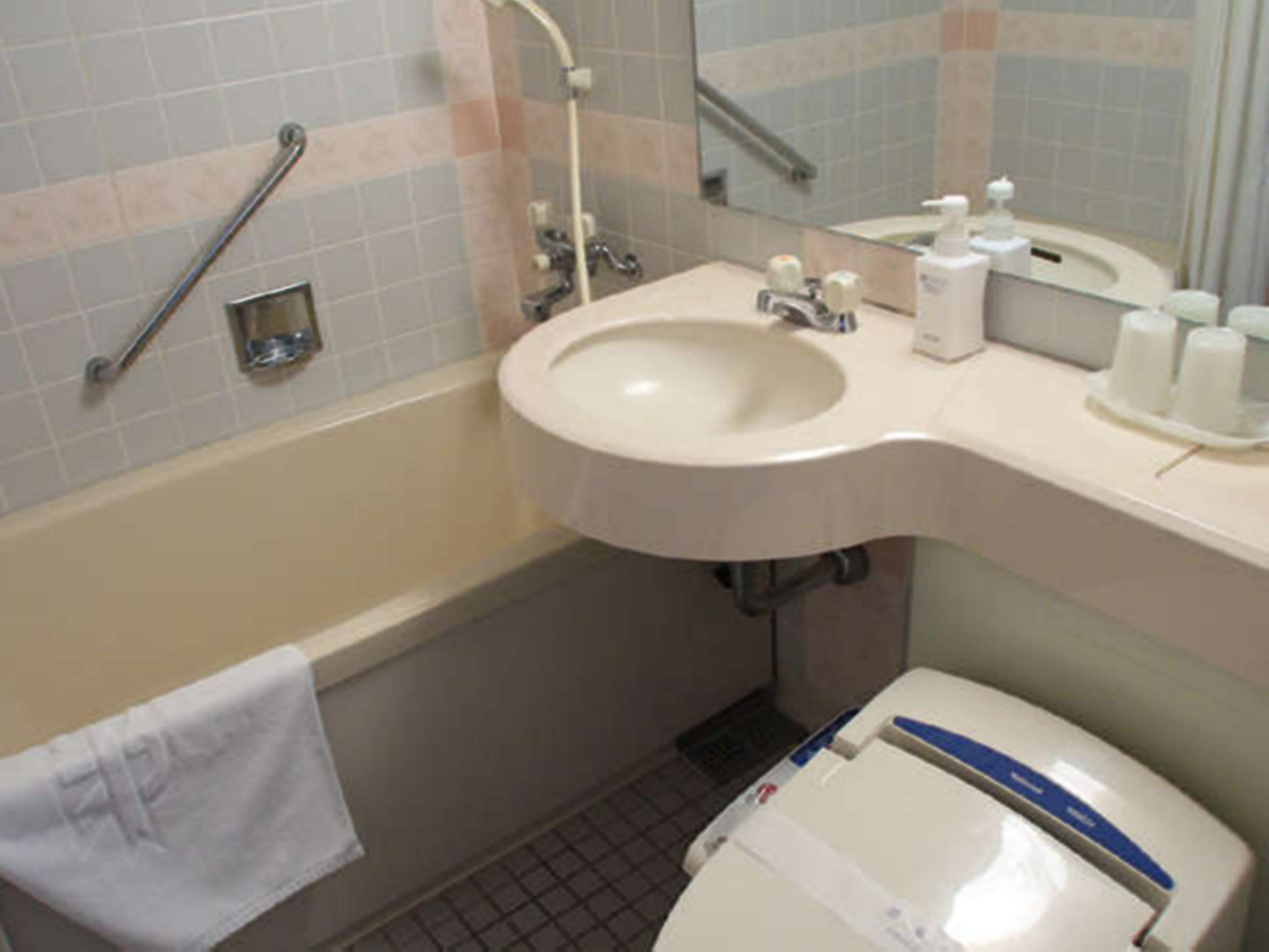 free toiletries, slippers, electronic bidet, towels