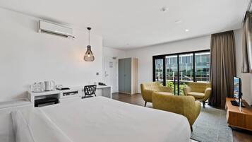 Desk, blackout curtains, soundproofing, iron/ironing board