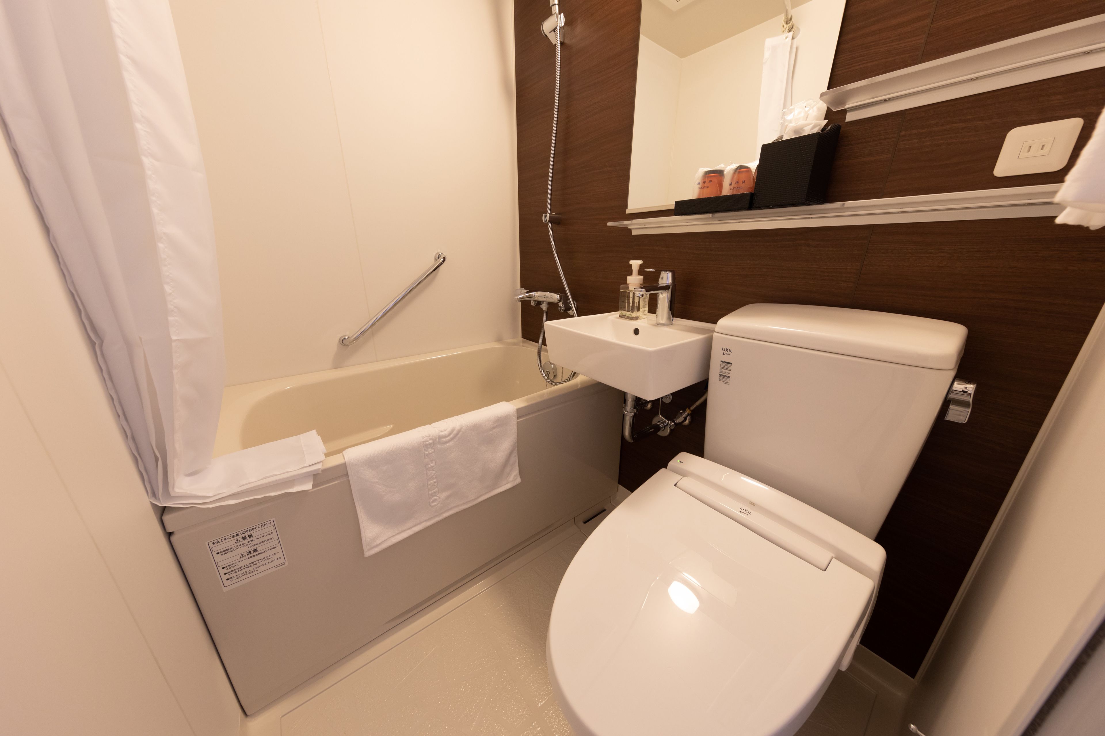 combined shower/bathtub, free toiletries, hair dryer, bathrobes