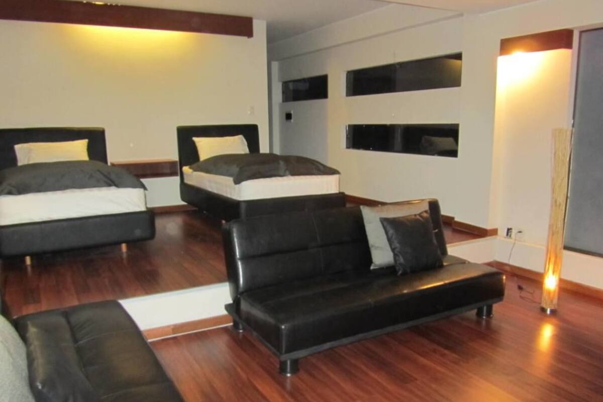 Flat-screen TV, DVD player, pay movies