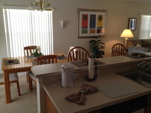 Full-sized fridge, microwave, stovetop, dishwasher