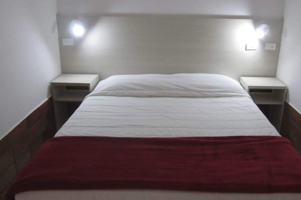 Quarto Economico Triplo