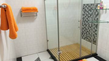 Apartment, 1 Bedroom | Bathroom | Shower, rainfall showerhead, bathrobes, towels
