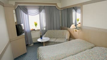 Twin Room | 1 bedroom, desk, blackout drapes, free cribs/infant beds