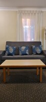Family Suite, 2 Bedrooms | Living area | 32-inch LCD TV with digital channels, TV