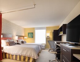 Room, 2 Queen Beds, Non Smoking | In-room safe, desk, iron/ironing board, free cribs/infant beds